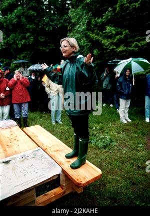 Minister for the Environment Anna Lindh thought that the visit to Ombergsliden, south of Vadstena, Sweden, was rewarding despite the rain. Stock Photo