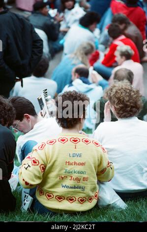 Audience gather outside the Wembley arena prior to the Michael Jackson concert. 15th July 1988. Stock Photo