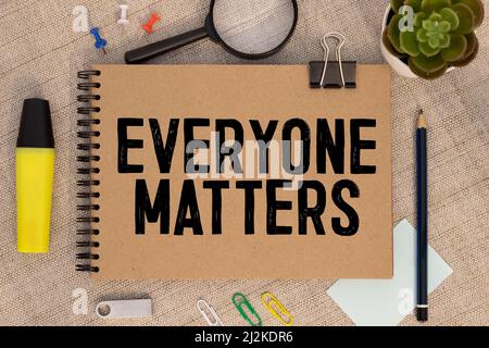 Everyone Matters phrase written on a grunge paper. Stock Photo