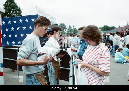 Audience gather outside the Wembley arena prior to the Michael Jackson concert. 15th July 1988. Stock Photo