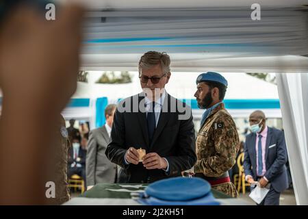 Goma, Drc. 2nd Apr, 2022. UN Under-Secretary-General for Peacekeeping Operations Jean-Pierre Lacroix (Front) holds a candle at a memorial service in Goma, the Democratic Republic of the Congo (DRC), on April 2, 2022. UN peacekeeping mission in the Democratic Republic of the Congo paid a final tribute Saturday to the eight peacekeepers who died during a helicopter crash Tuesday in northeastern DRC. Credit: Zanem Nety Zaidi/Xinhua/Alamy Live News Stock Photo