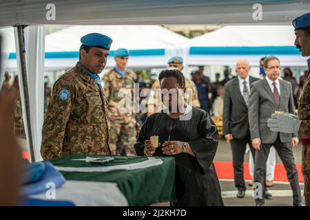 Goma, Drc. 2nd Apr, 2022. Bintou Keita (C), top UN envoy in the Democratic Republic of the Congo (DRC), holds a candle at a memorial service in Goma, DRC, on April 2, 2022. UN peacekeeping mission in the Democratic Republic of the Congo paid a final tribute Saturday to the eight peacekeepers who died during a helicopter crash Tuesday in northeastern DRC. Credit: Zanem Nety Zaidi/Xinhua/Alamy Live News Stock Photo