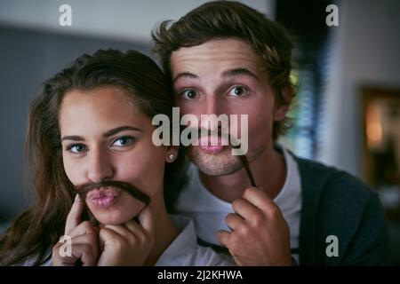 My partner is my best friend. Cropped shot of a loving young couple spending the day together at home. Stock Photo