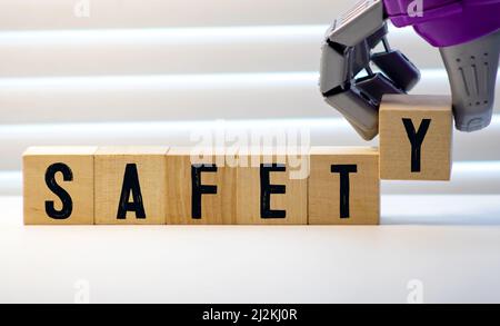 safety word written on wood block. safety text on wooden table for your desing, concept Stock Photo