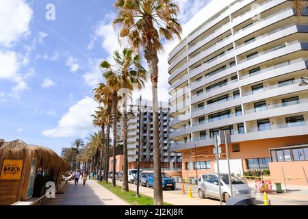 Sea front, beach and hotels now busy again as visitors return to holiday in Torremolinos, Malaga, Spain Stock Photo