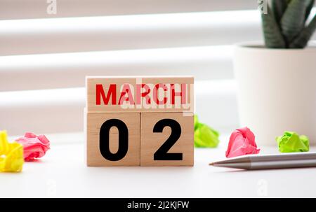 Wooden Perpetual Calendar set to March 2nd. Stock Photo