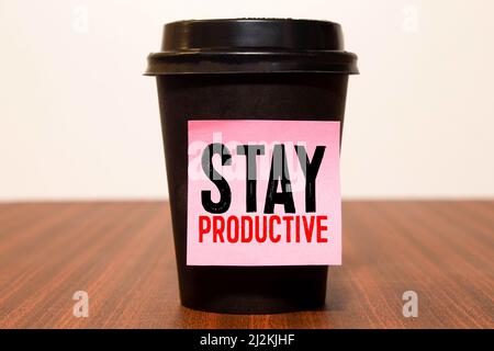 Conceptual hand writing showing Stay Productive Motivational Call. Business photo text Efficiency Concentration Productivity Text white paper hand bla Stock Photo