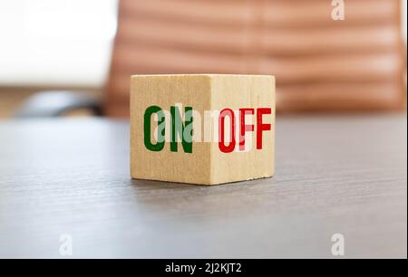 Light switch with on off word on green background Stock Photo