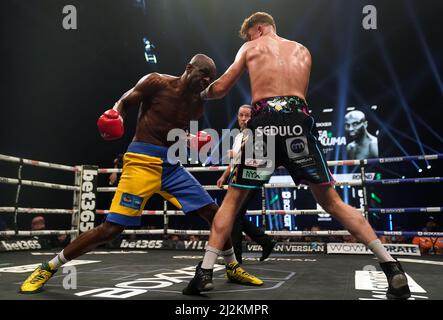 Lukas Ndafoluma (left) and Bradley Rea in the middle weight bout at the Utilita Arena, Newcastle. Picture date: Saturday April 2, 2022. Stock Photo