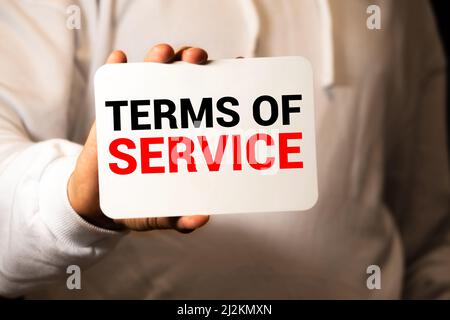 Term of service text concept write on notebook. Stock Photo