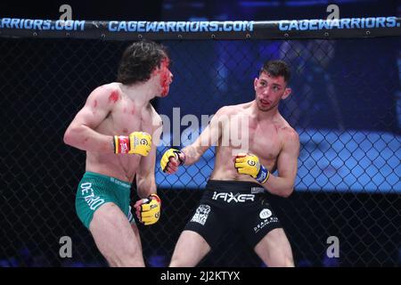 MANCHESTER, UK. APR 2ND Luke Riley finishes Jack Eglin in the second round of their bantamweight bout at Cage Warriors 136 at Bowlers Exhibition Centre in Manchester, England on Saturday 2nd April 2022. (Credit: Kieran Riley | MI News) Credit: MI News & Sport /Alamy Live News Stock Photo