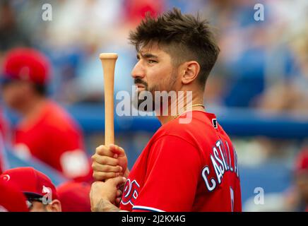 Philadelphia Phillies - Photo of Nick Castellanos wearing the powder blue  Phillies jersey in the dugout.