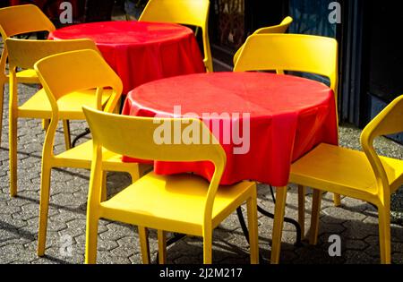 Red Tables and Yellow Chairs Victoria BC Stock Photo