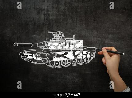 tank on the blackboard drawn in chalk Stock Photo