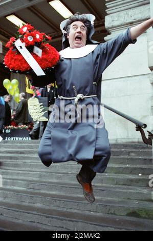 Comedian and actor Terry Jones takes part in a rail tunnel protest outside Waterloo Station, London. 4th March 1989. Stock Photo