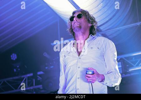 Southampton, UK. 01st Apr, 2022. Nick Reynolds, aka Harpo Strangelove harmonica player, singer, UK's foremost creator of Death Masks and son of Great Train Robber Bruce Reynolds with the British acid country band Alabama 3, known as A3 in the United States performing live on stage at the Engine Rooms Southampton. (Photo by Dawn Fletcher-Park/SOPA Images/Sipa USA) Credit: Sipa USA/Alamy Live News Stock Photo