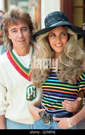 Bill Wyman and Mandy Smith at Sticky Fingers, Bill's new restaurant in Kensington. 9th May 1989. Stock Photo