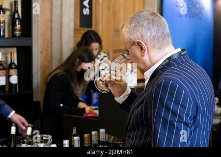 Porto, Portugal. 02nd Apr, 2022. A man seen tasting wine at the stands of the essence of wine event. Essencia do Vinho is the main wine experience in Portugal meets the coming of age edition from March 31 to April 3 at Palácio da Bolsa, in Porto. More than 4,000 wines representing 400 national and foreign producers. (Photo by Rita Franca/SOPA Images/Sipa USA) Credit: Sipa USA/Alamy Live News Stock Photo