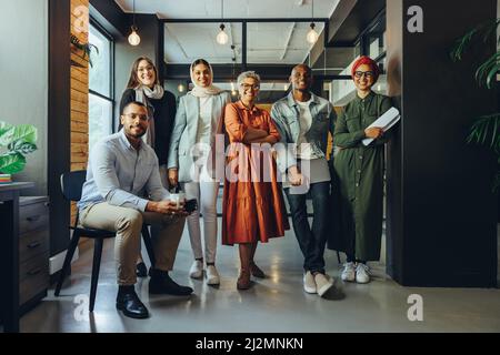 successful business team running in the office hall Stock Photo - Alamy