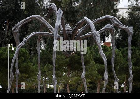 The sculpture 'Maman' (1999) by French-US artist Louise Bourgeois is installed for the Contemporary Art Installation at the Stavros Niarchos Foundation Cultural Center (SNFCC). The 'iconic giant spider' is described by the SNFCC as 'one of the works that made the artist internationally famous.' The more than 10 meters tall sculpture which the Greek Organization for Culture and Development NEON and the SNFCC brought to Greece 'will be on display at SNFCC's Esplanade for a seven-month period Stock Photo