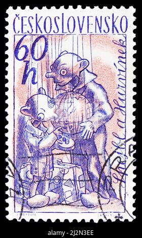 MOSCOW, RUSSIA - MARCH 13, 2022: Postage stamp printed in Czechoslovakia shows Spejbl a Hurvinek, Czechoslovak puppet serie, circa 1961 Stock Photo