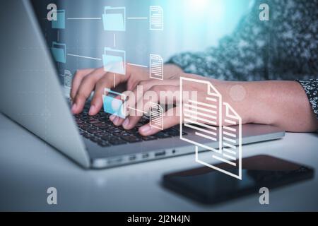 Document Database Management Storage on Digital Cloud Computing Network System. Businesswoman Woking on Laptop Computer While Managing Corporate Docum Stock Photo