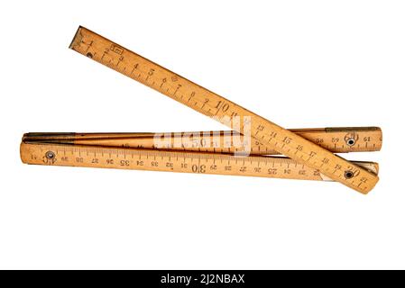 Wooden Folding rule isolated on white, old ruler, clipping path Stock Photo