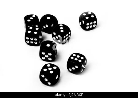close up of black dices isolated on white Stock Photo