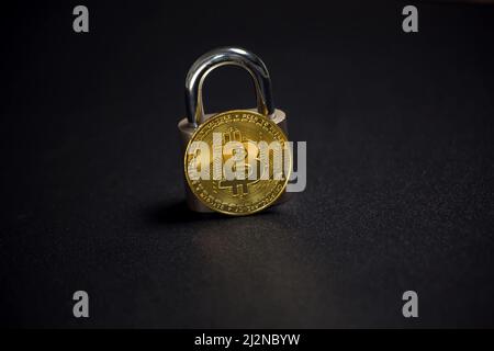 Bitcoin and lock. Cryptocurrency investment security and safety concept Stock Photo