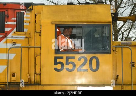 REEFTON, NEW ZEALAND, SEPTEMBER 6, 2021: An unidentified train driver checks his log book as he prepares to move out from Reefton Railway Station, Sep Stock Photo