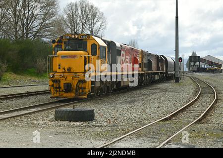 REEFTON, NEW ZEALAND, SEPTEMBER 6, 2021: A freight train at Reefton  Railway Station, September 6,  2021. Stock Photo