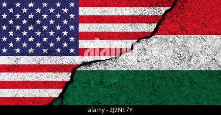 USA and Hungary. Flags painted on cracked concrete wall. United States, America. Partnership, relationships and conflict concept. Banner background Stock Photo