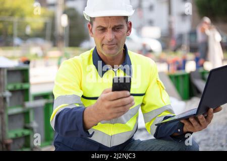 architect supervising a construction outdoords Stock Photo