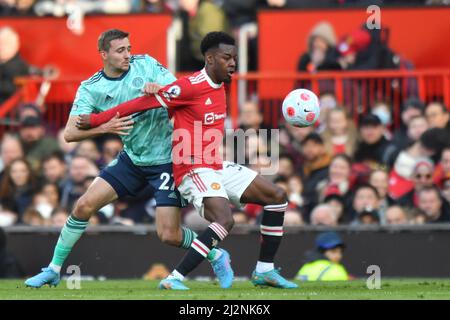 Leicester City's Timothy Castagne and Manchester United's Anthony Elanga during the Premier League match at Old Trafford, Greater Manchester, UK. Picture date: Saturday April 2, 2022. Photo credit should read: Anthony Devlin Stock Photo