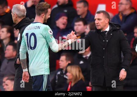 Leicester City manager Brendan Rodgers and Leicester City's James Maddison during the Premier League match at Old Trafford, Greater Manchester, UK. Picture date: Saturday April 2, 2022. Photo credit should read: Anthony Devlin Stock Photo