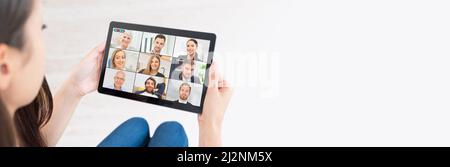 Video conference with multiple employees. Tablet application for remote work and study from home. Stock Photo