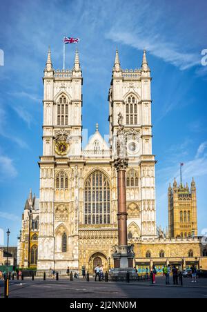 London, United Kingdom - July 3, 2015: Westminster Abbey in London and few tourists around as seen on 3rd of July, 2015. Traditional place of coronati Stock Photo