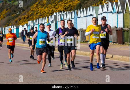Bournemouth, Dorset, UK. 3rd April 2022. Runners take part in the Bournemouth Bay Run which provides the option of a Half Marathon, 10k Run, 5k Run and 1k Kids Fun Run along Bournemouth's sea front. Participants get amazing views along the coast as they take part raising vital funds for the British Heart Foundation charity to fight against heart disease. A dry sunny day after a cold frosty start. Half marathon runners. Credit: Carolyn Jenkins/Alamy Live News Stock Photo
