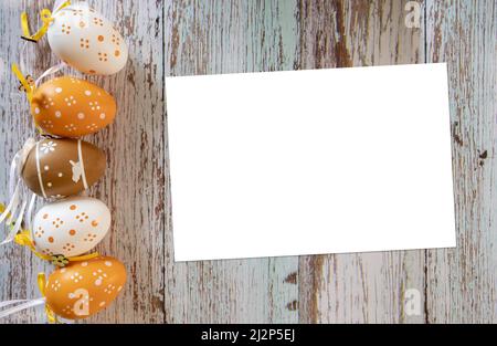 Happy Easter. Greetings card for an Easter full of love. Painted eggs and copy space for your message. Stock Photo