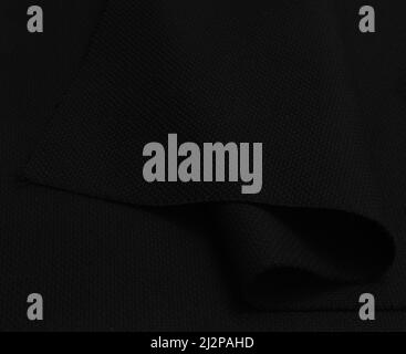 Black fabric texture background. Texture fabric for embroidery. Black blank canvas with pleats as a background Stock Photo