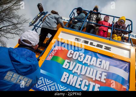 Moscow, Russia. 3rd of April, 2022.A BelAZ-7555A mining dump truck on display at an exhibition of cutting edge products showcasing Russian and Belarusian engineering industry, at the VDNKh Exhibition Centre. The banner reads 'Creating the future together'.The exhibition opened on the Day of Unity Between the Peoples of Russia and Belarus, which is celebrated annually on 2 April Stock Photo
