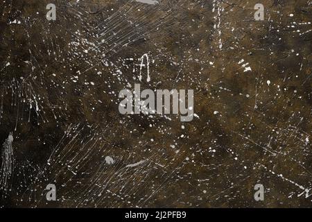 Abstract concrete background splattered with paint drops Stock Photo