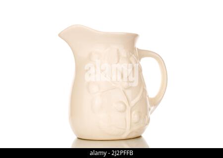 a white ceramic milk pot on a white background Stock Photo - Alamy