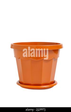 Brown, plastic, empty flower pot on a white background Stock Photo