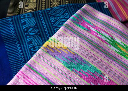 Tai Long or Tai Yai ethnic textiles, elegant details of fabrics from Shan State, Myanmar. Top view. Close-up. Stock Photo