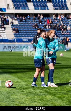 Mathilde Bourdieu of Paris FC and Celina Ould Hocine of Paris FC warm up ahead of the Women's French championship, D1 Arkema football match between Paris FC and Paris Saint-Germain on April 3, 2022 at Sebastien Charlety stadium in Paris, France - Photo Melanie Laurent / A2M Sport Consulting / DPPI Stock Photo