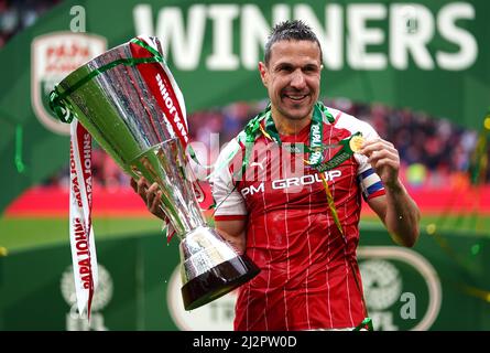 Rotherham United's Richard Wood lifts the trophy following the Papa John's Trophy final at Wembley Stadium, London. Picture date: Sunday April 3, 2021. Stock Photo