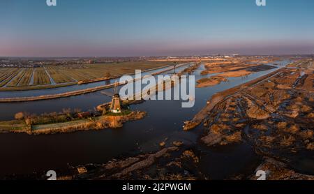 Aerial panoramas of the historic windmills of Kinderdijk, UNESCO World Heritage site, Alblasserdam, South Holland, Netherlands. Stock Photo