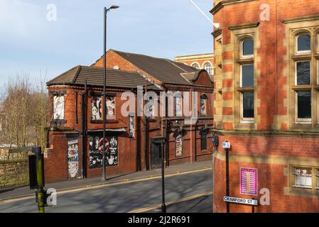 Wigan, England - United Kingdom - March 15th, 2022: Exterior of old brick building in English city. Stock Photo