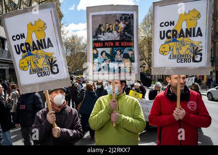 Protesters Hold Placards Expressing Their Opinions During The ...